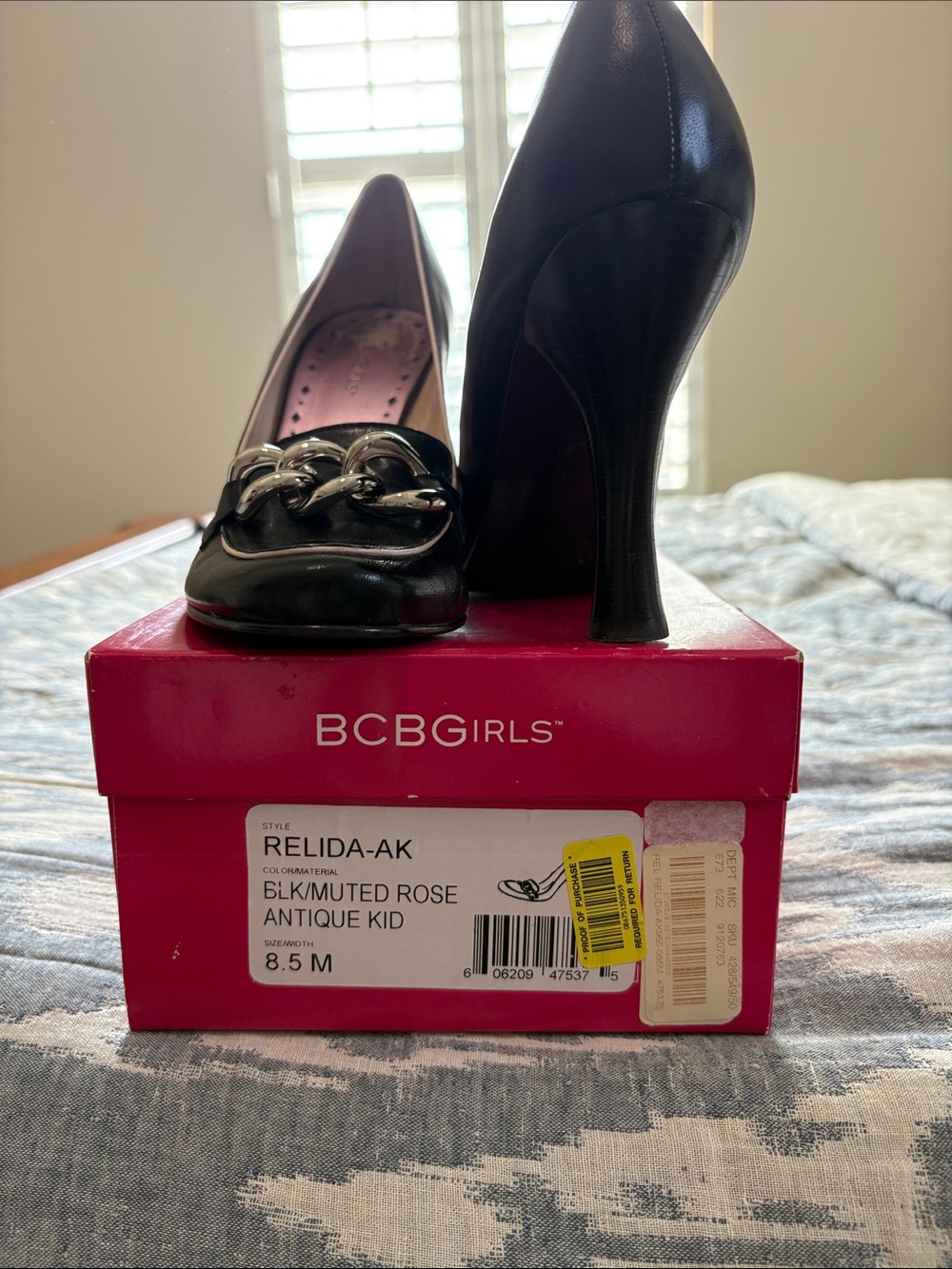 BCBGirls Black Pumps with Muted Rose Interior and Decorative Chain
